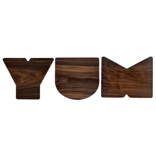 Yum 3 Letter Board Set handcrafted from solid walnut, perfect for charcuterie spreads, kitchen styling, or gifting