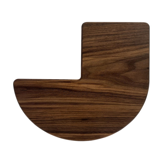 Letter J-shaped charcuterie board made from sustainably sourced American walnut with a food-safe finish and beveled edges, perfect for serving meats, cheeses, fruits, or desserts at personalized gatherings or initial-themed events.