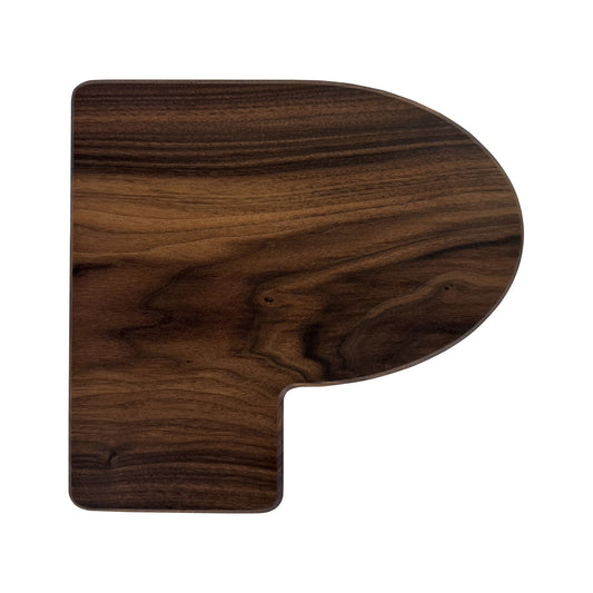 Letter P-shaped charcuterie board made from sustainably sourced American walnut with a food-safe finish and beveled edges, perfect for serving meats, cheeses, fruits, or desserts at personalized gatherings or initial-themed events.