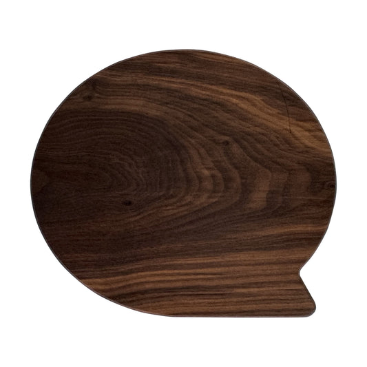 Letter Q-shaped charcuterie board made from sustainably sourced American walnut with a food-safe finish and beveled edges, perfect for serving meats, cheeses, fruits, or desserts at personalized gatherings or initial-themed events.