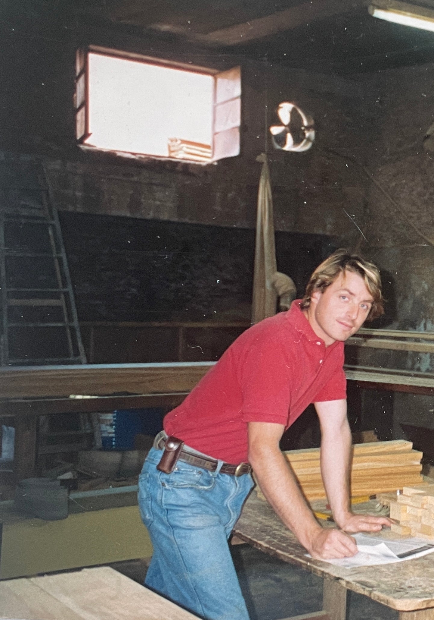Marcelo, third-generation woodworker and co-founder of Boardward, standing in the Virginia workshop