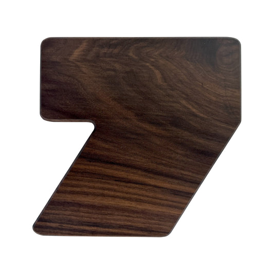 Number 7-shaped charcuterie board crafted from sustainably sourced American walnut with a food-safe finish and beveled edges, ideal for stylishly serving meats, cheeses, fruits, or desserts at birthdays and milestone celebrations